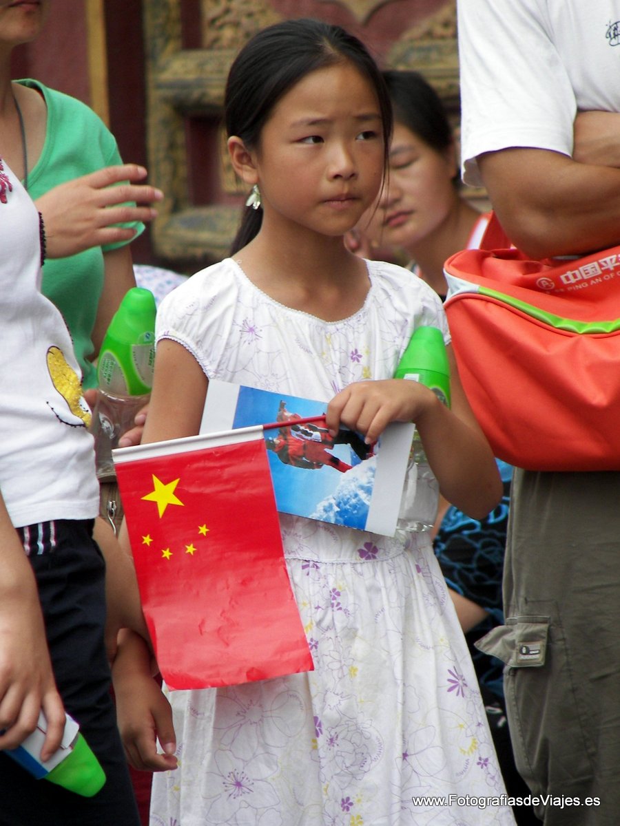 Joven en La Ciudad Prohibida en Pekín, China
